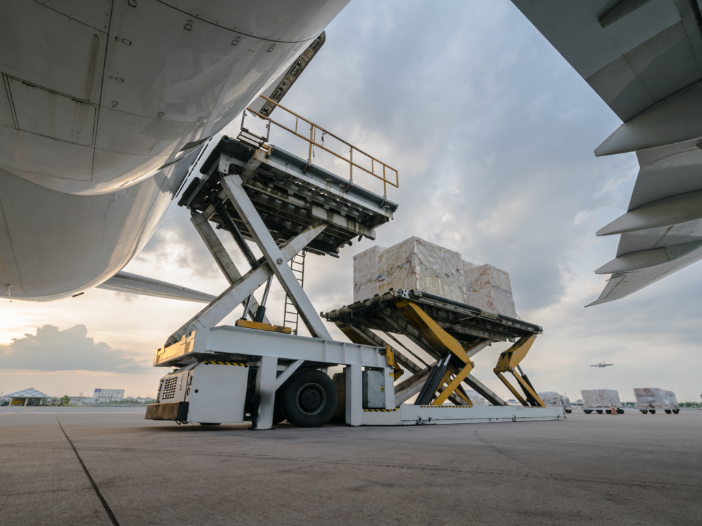 Why Air Cargo Shipments Get Rejected at Airline Tender 1 Aircraft cargo loading operation using a high loader during airline cargo tender and acceptance process.